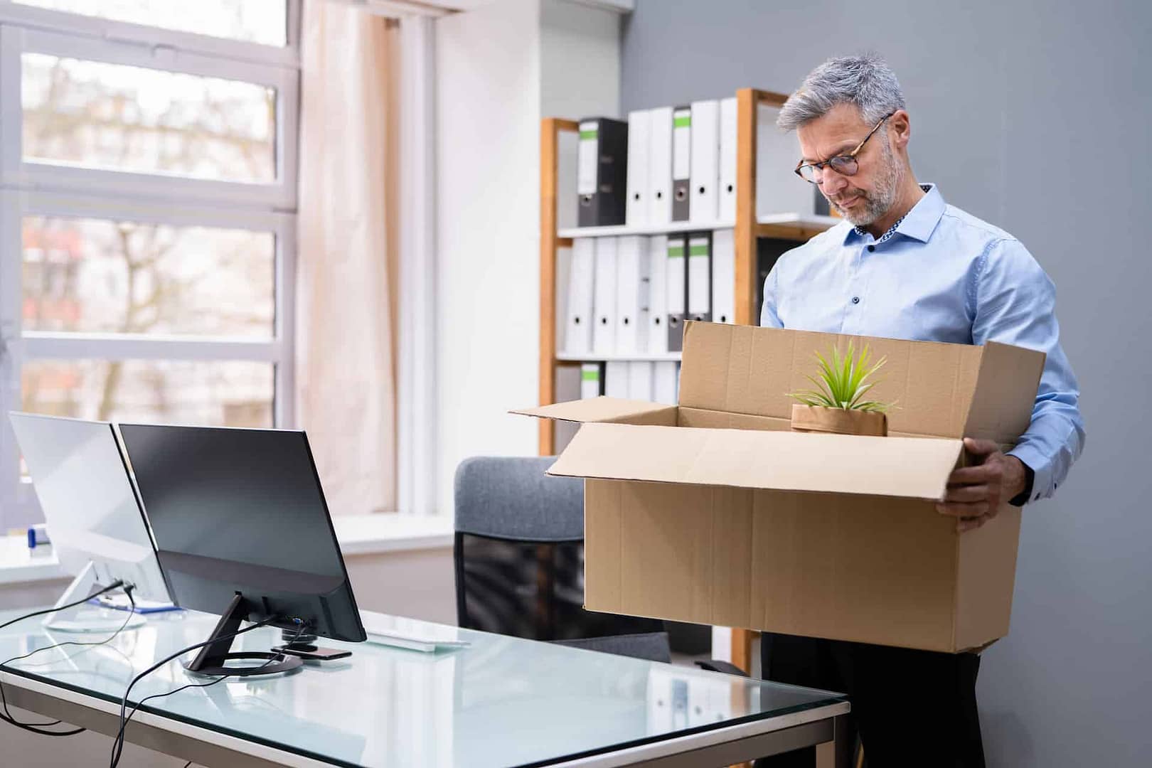 Job Quit. Employee Holding Cardboard Box
